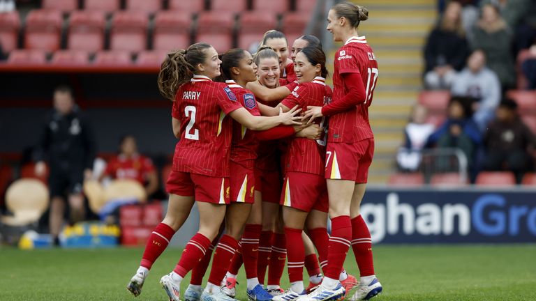 Liverpool's Marie Hobinger scored a free kick and a last-minute penalty to beat Spurs