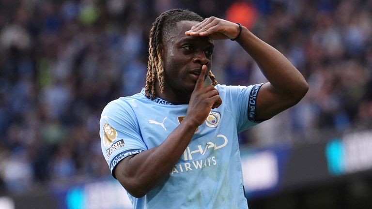 Manchester City's Jeremy Doku celebrates scoring his team's third goal against Fulham