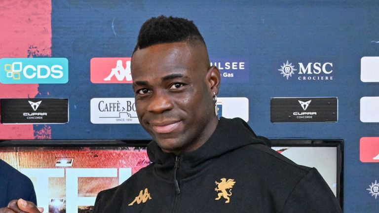 Mario Balotelli and Genoa sports director Marco Ottolini pose with Balotelli's jersey in Genoa, Italy, Monday, Oct. 28, 2024. (Tano Pecoraro/LaPresse via AP)