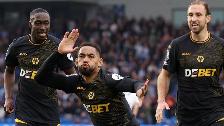 Matheus Cunha (middle) celebrates scoring Wolves' late equaliser.