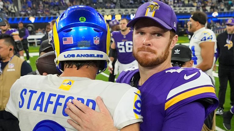 Los Angeles Rams quarterback Matthew Stafford (9) and Minnesota Vikings quarterback Sam Darnold, center right, hug after an NFL football game, Thursday, Oct. 24, 2024, in Inglewood, Calif. (AP Photo/Mark J. Terrill)