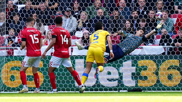 Bristol City goalkeeper Max O'Leary saves a shot