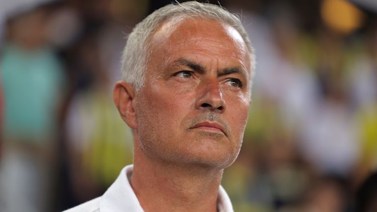 Fenerbahce's head coach Jose Mourinho stands on the pitch during the Turkish Super Lig soccer match between Fenerbahce and Adana Demirspor in Istanbul, Saturday, Aug. 10, 2024. (AP Photo)