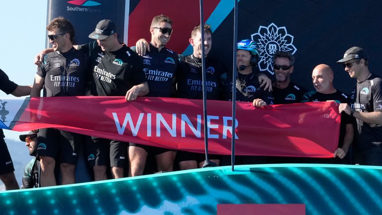 Emirates Team New Zealand crew celebrates after winning the Louis Vuitton 37th America's Cup in Barcelona, Spain, Saturday, Oct.19, 2024. (AP Photo/Bernat Armangue)