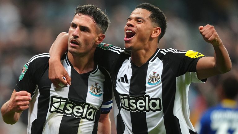 Newcastle United's Fabian Schar (left) celebrates scoring the opening goal against AFC Wimbledon