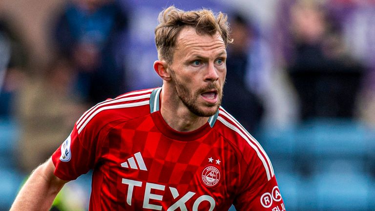 DUNDEE, SCOTLAND - SEPTEMBER 28: Aberdeen's Nicky Devlin in action during a William Hill Scottish Premiersihp match between Dundee FC and Aberdeen at the Scot Foam Stadium at Dens Park, on September 28, 2024, in Dundee, Scotland.(Photo by Rob Casey / SNS Group)