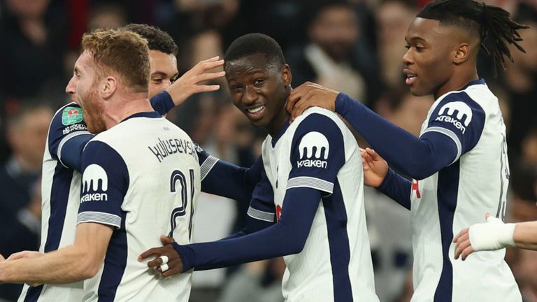 Pape Matar Sarr celebrates with team-mates after putting Spurs 2-0 up (AP Photo/Ian Walton)