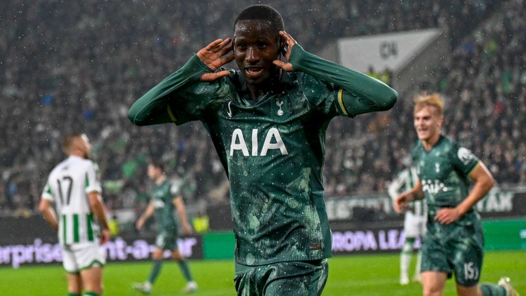 Tottenham's Pape Matar Sarr celebrates after scoring his side's opening goal during the Europa League soccer match between Ferencvaros and Tottenham Hotspur in Budapest, Hungary, Thursday, Oct. 3, 2024. (AP Photo/Denes Erdos)