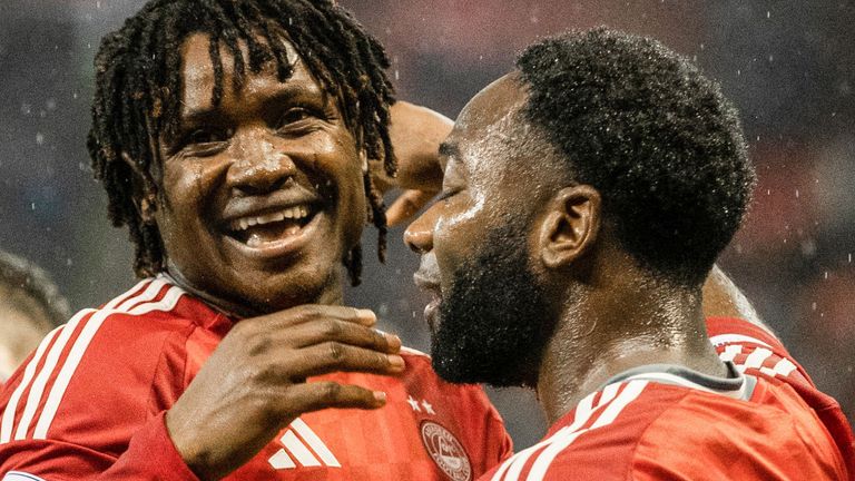 ABERDEEN, SCOTLAND - OCTOBER 26: Aberdeen's Peter Ambrose celebrates with Shayden Morris after scoring to make it 1-0 during a William Hill Premiership match between Aberdeen and Dundee United at Pittodrie Stadium, on October 26, 2024, in Aberdeen, Scotland. (Photo by Craig Williamson / SNS Group)