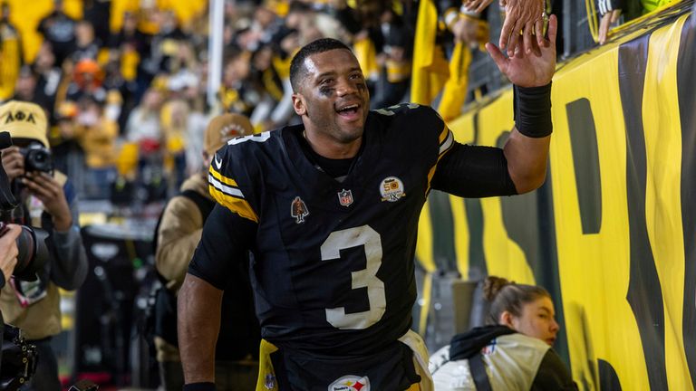 Pittsburgh Steelers quarterback Russell Wilson (3) high fives fans after an NFL football game, Sunday, Oct. 20, 2024, in Pittsburgh. (AP Photo/Matt Durisko)