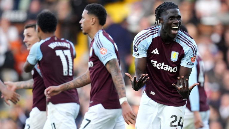 Amadou Onana celebrates after Aston Villa take a 3-1 lead at Fulham thanks to an Issa Diop own goal