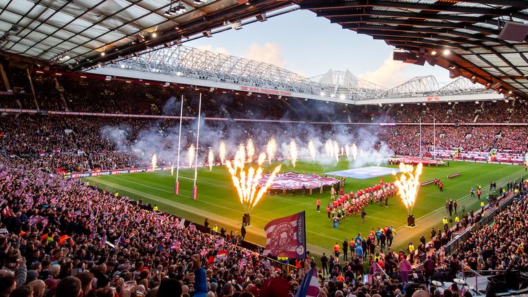 Picture by Allan McKenzie/SWpix.com - 12/10/2024 - Rugby League - Betfred Super League Grand Final - Wigan Warriors v Hull KR - Old Trafford, Manchester, England - WIgan & Hull KR comeo ut to the field of play in the Betfred Super League Grand Final.