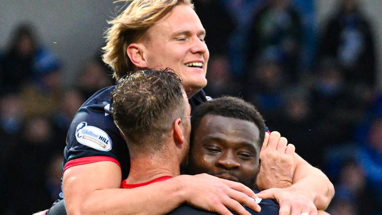 DINGWALL, SCOTLAND - OCTOBER 26: Ross County's Alex Samuel, Michael Efete, and Jordan White celebrate after an own goal from Kilmarnock's Joe Wright makes it 2-1 during a William Hill Premiership match between Ross County and Kilmarnock at the Global Energy Stadium, on October 26, 2024, in Dingwall, Scotland. (Photo by Rob Casey / SNS Group)