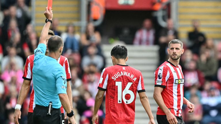 Southampton's  Jack Stephens reacts as he receives his red card