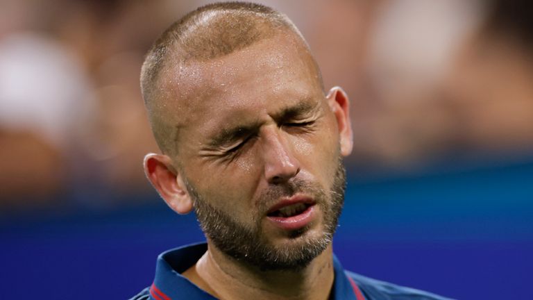 Daniel Evans, of the United Kingdom, reacts after losing a point to Alex de Minaur, of Australia, during the third round of the U.S. Open tennis championships, Saturday, Aug. 31, 2024, in New York. (AP Photo/Adam Hunger)