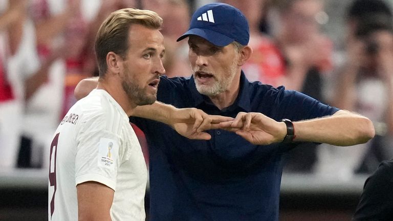 FILE - Then Bayern head coach Thomas Tuchel talks to Harry Kane during the German Super Cup final against RB Leipzig in 2023. (AP Photo/Matthias Schrader, File)