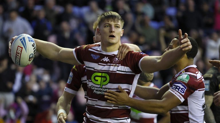 Wigan Warriors' Sam Walters celebrates after scoring his second try during the Betfred Super League, play off, semi-final match at The Brick Community Stadium, Wigan. Picture date: Saturday October 5, 2024.