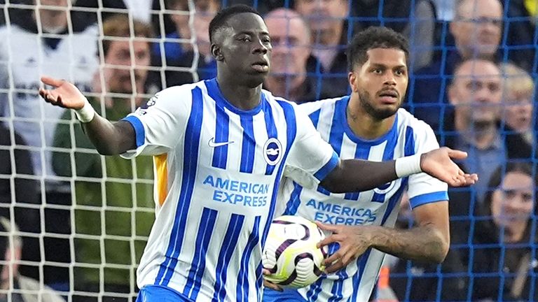 Brighton's Yankuba Minteh celebrates after pulling a goal back against Tottenham