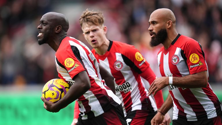 Yoane Wissa celebrates after reducing the deficit at home to Ipswich