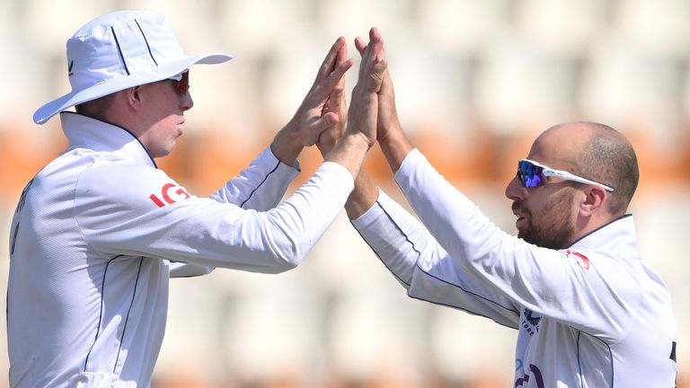 England's Zak Crawley congratulates bowler Jack Leach after the pair combined to dismiss Shan Masood during day one of the second test against Pakistan.