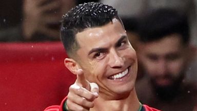 Portugal's Cristiano Ronaldo, center, points at teammates Vitinha when celebrating after scoring his side's fifth goal during the UEFA Nations League soccer match between Portugal and Poland at the Dragao stadium in Porto, Portugal, Friday, Nov. 15, 