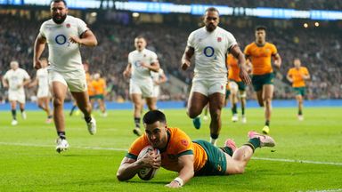 Australia's Tom Wright crosses the try line