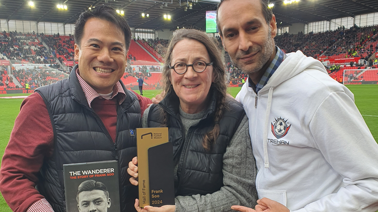 Alan Lau and Sky Sports News' Dev Trehan join Jacqui Soo at Frank Soo's induction into the National Football Museum Hall of Fame during Stoke City vs Derby County