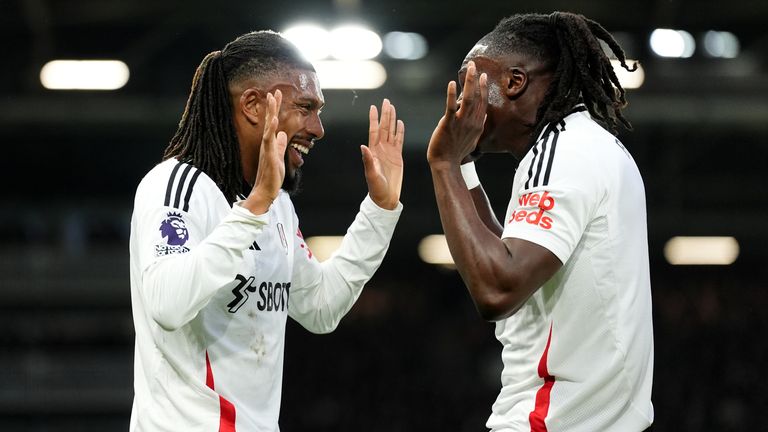 Fulham's Alex Iwobi (left) celebrates after scoring his sides first goal of the game