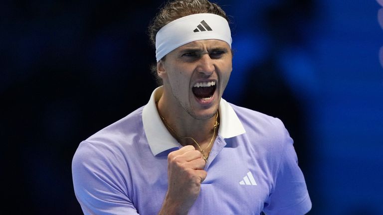 Germany's Alexander Zverev reacts during the singles tennis match of the ATP World Tour Finals against Russia's Andrey Rublev, at the Inalpi Arena, in Turin, Italy, Monday, Nov. 11, 2024. (AP Photo/Antonio Calanni)