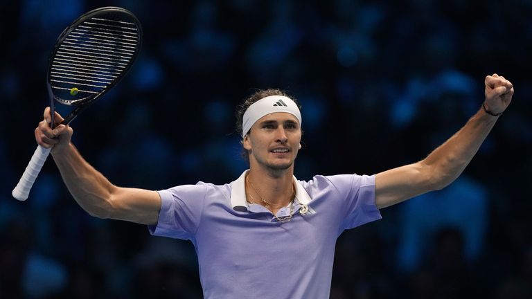 Germany's Alexander Zverev celebrates after winning the set point during the singles tennis match of the ATP World Tour Finals against Spain's Carlos Alcaraz, at the Inalpi Arena, in Turin, Italy, Friday, Nov. 15, 2024. (AP Photo/Antonio Calanni)