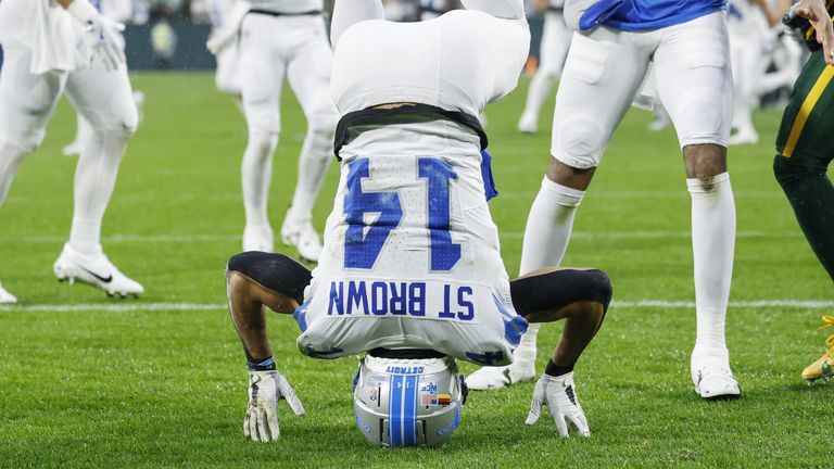 Amon-Ra St Brown celebrates his touchdown for the Lions 