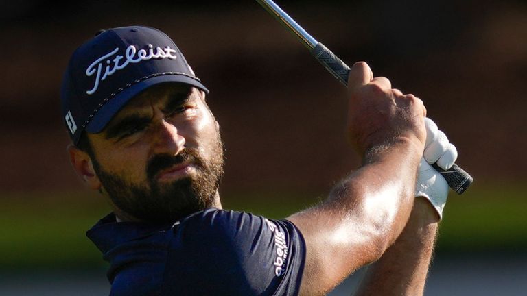 Antoine Rozner of France plays his second shot on the 17th hole during the second round of World Tour Golf Championship in Dubai, United Arab Emirates, Friday, Nov. 15, 2024. (AP Photo/Altaf Qadri)  