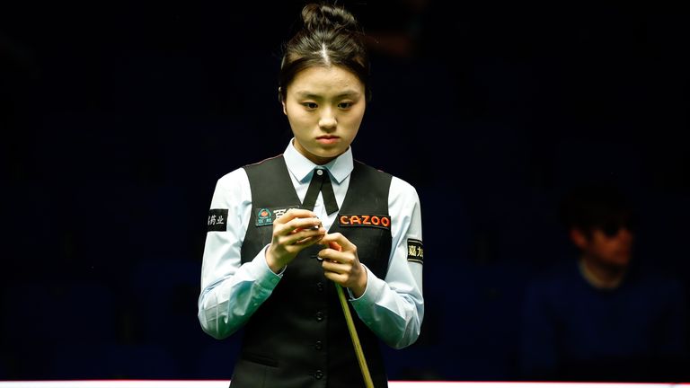 Bai Yulu of China chalks the cue in the first round match against Jenson Kendrick of England on day one of 2024 World Championship Qualifiers at the English Institute of Sport on April 8, 2024 in Sheffield, England. (Photo by Tai Chengzhe/VCG via Getty Images)