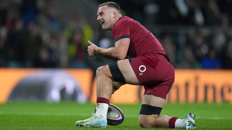 England's Ben Earl celebrates after scoring a try (AP Photo/Alastair Grant)