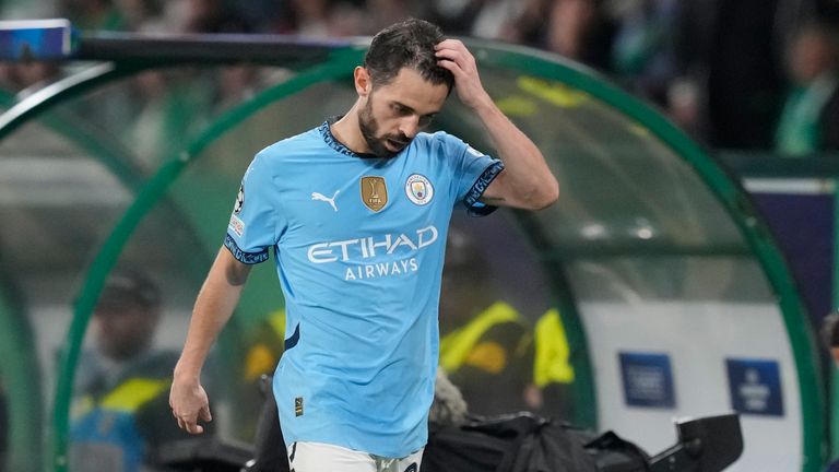 Manchester City's Bernardo Silva walks to the bench as he is substituted during the UEFA Champions League opening phase match between Sporting and Manchester City in Lisbon, Portugal, Tuesday, Nov. 5, 2024. (AP Photo/Armando Franca)