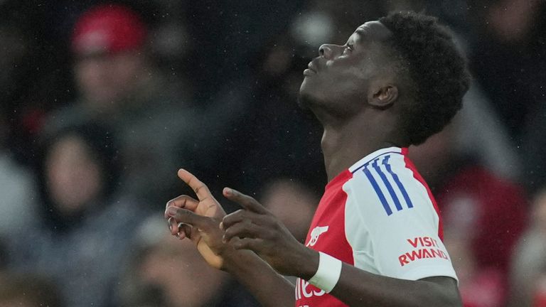 Bukayo Saka celebrates his opener (AP Photo/Kin Cheung)