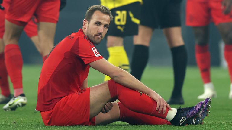 Harry Kane goes down with a injury during Bayern Munich's clash with Borussia Dortmund