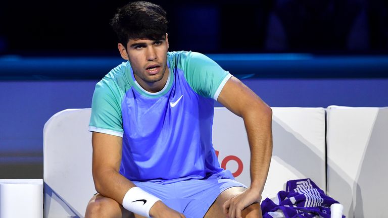 Carlos Alcaraz of Spain looks on between games in his match against Casper Ruud of Norway during day two of the Nitto ATP finals 2024 at Inalpi Arena on November 11, 2024 in Turin, Italy. (Photo by Valerio Pennicino/Getty Images)