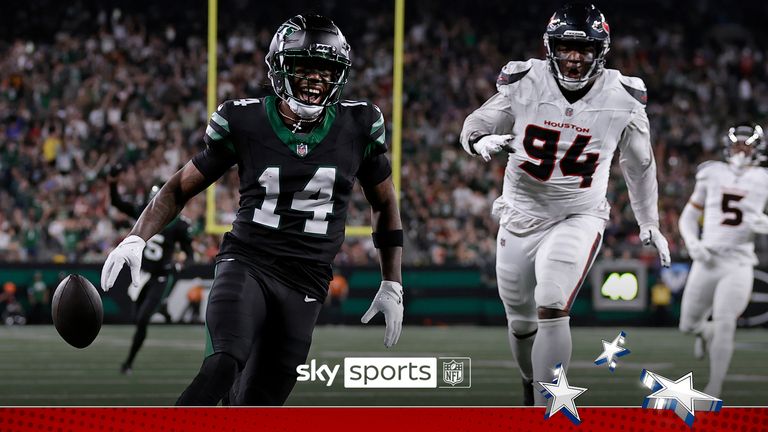 New York Jets wide receiver Malachi Corley (14) drops the ball short of a touchdown in front of Houston Texans defensive tackle Khalil Davis (94) during an NFL football game Thursday, Oct. 31, 2024, in East Rutherford, N.J. (AP Photo/Adam Hunger)


