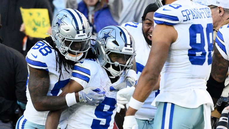 Dallas Cowboys wide receiver KaVontae Turpin (9) celebrates with teammates after scoring a 99-yard touchdown off a kickoff return during the second half of an NFL football game against the Washington Commanders, Sunday, Nov. 24, 2024, in Landover, Md. (AP Photo/Nick Wass)