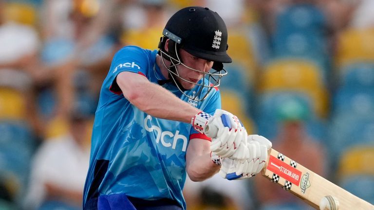 England's Dan Mousley plays a shot from a delivery of West Indies' Matthew Forde during the third ODI cricket match at Kensington Oval in Bridgetown, Barbados, Wednesday, Nov. 6, 2024. (AP Photo/Ricardo Mazalan)