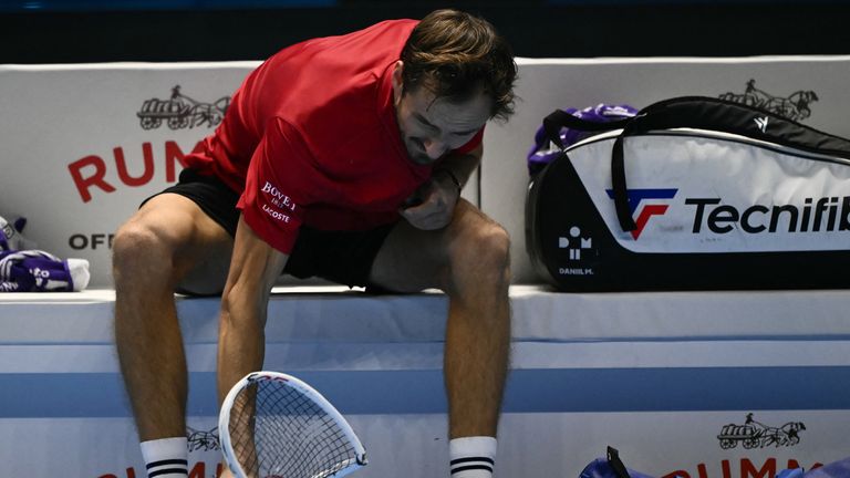 Russia's Daniil Medvedev reacts breaking a racket during his match against USA's Taylor Fritz at the ATP Finals tennis tournament in Turin on November 10, 2024. (Photo by Marco BERTORELLO / AFP)