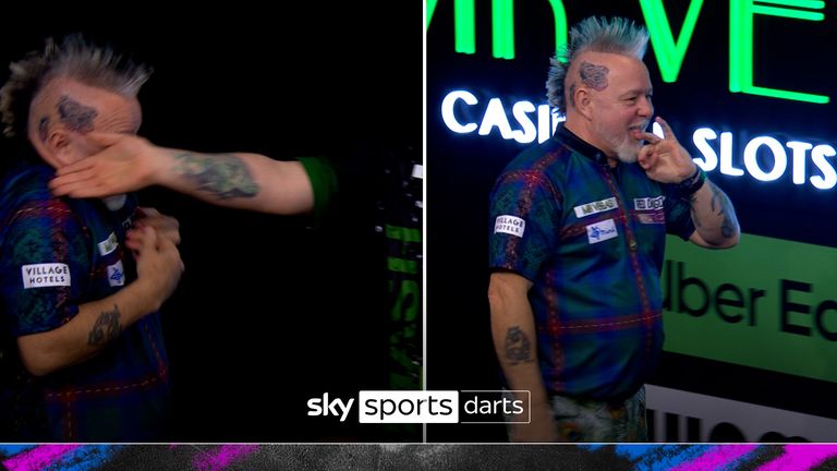 Peter Wright accidentally slapped by Martin Lukeman