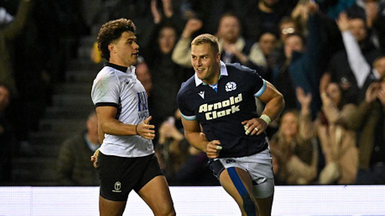 Scotland's wing Duhan van der Merwe celebrates scoring a try during the Autumn Nations Series International rugby union test match between Scotland and Fiji at Murrayfield Stadium in Edinburgh on November 2, 2024. (Photo by ANDY BUCHANAN / AFP)