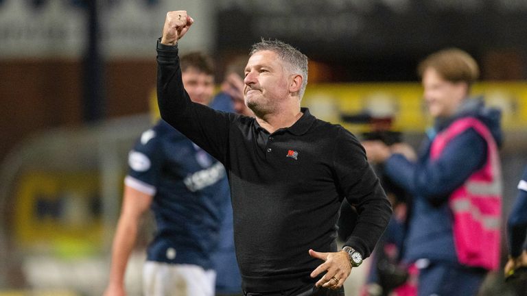 Dundee manager Tony Docherty celebrates after seeing his side pick up three points after two prior defeats