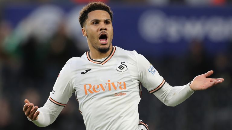 Myles Peart-Harris encourages the home supporters after setting up Swansea's equaliser against Portsmouth