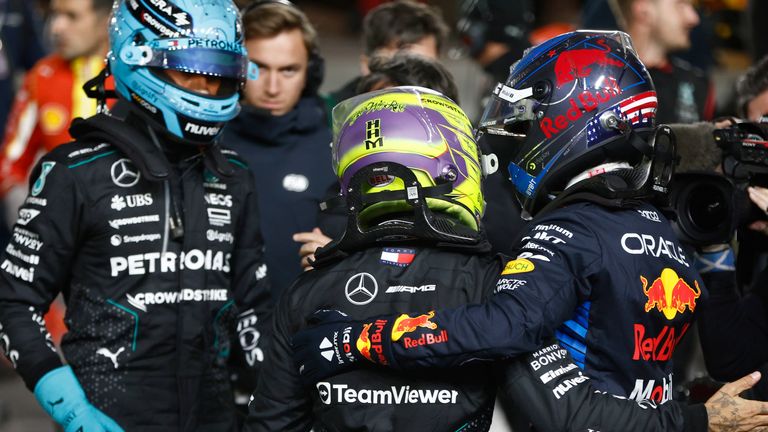 STREETS OF LAS VEGAS, UNITED STATES OF AMERICA - NOVEMBER 23: George Russell, Mercedes-AMG F1 Team, 1st position, Sir Lewis Hamilton, Mercedes-AMG F1 Team, 2nd position, and drivers champion Max Verstappen, Red Bull Racing, in Parc Ferme during the Las Vegas GP at Streets of Las Vegas on Saturday November 23, 2024, United States of America. (Photo by Zak Mauger / LAT Images)