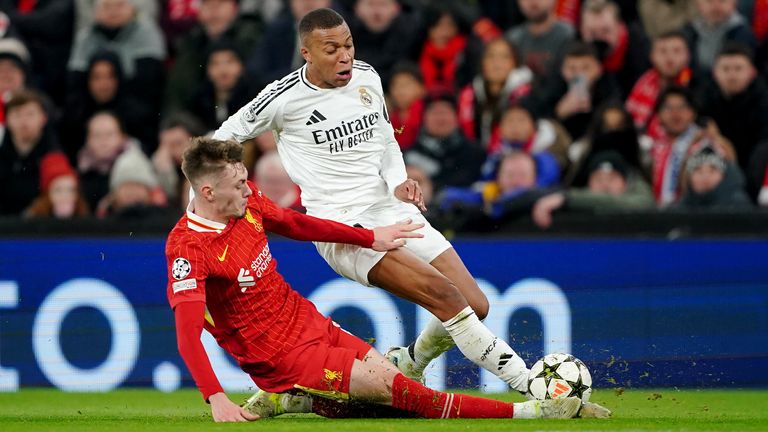 Liverpool's Conor Bradley (left) faces Real Madrid's Kylian Mbappe