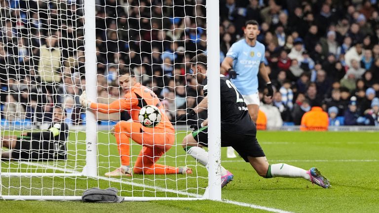 Santiago Gimenez has the simple task of chesting the ball across the goal line