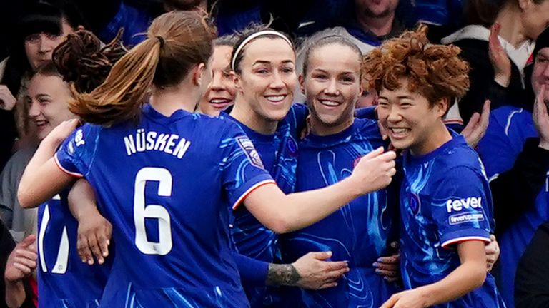 Chelsea's Guro Reiten celebrates scoring her penalty with team-mates